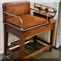 F01. Antique oak jockey chair scale. 